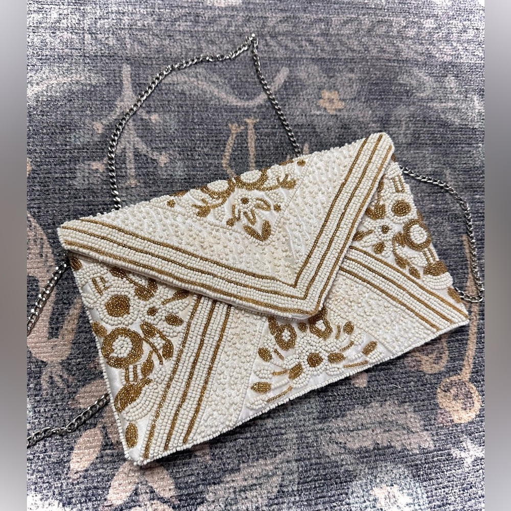Francesca's Cream and Gold Patterned Clutch